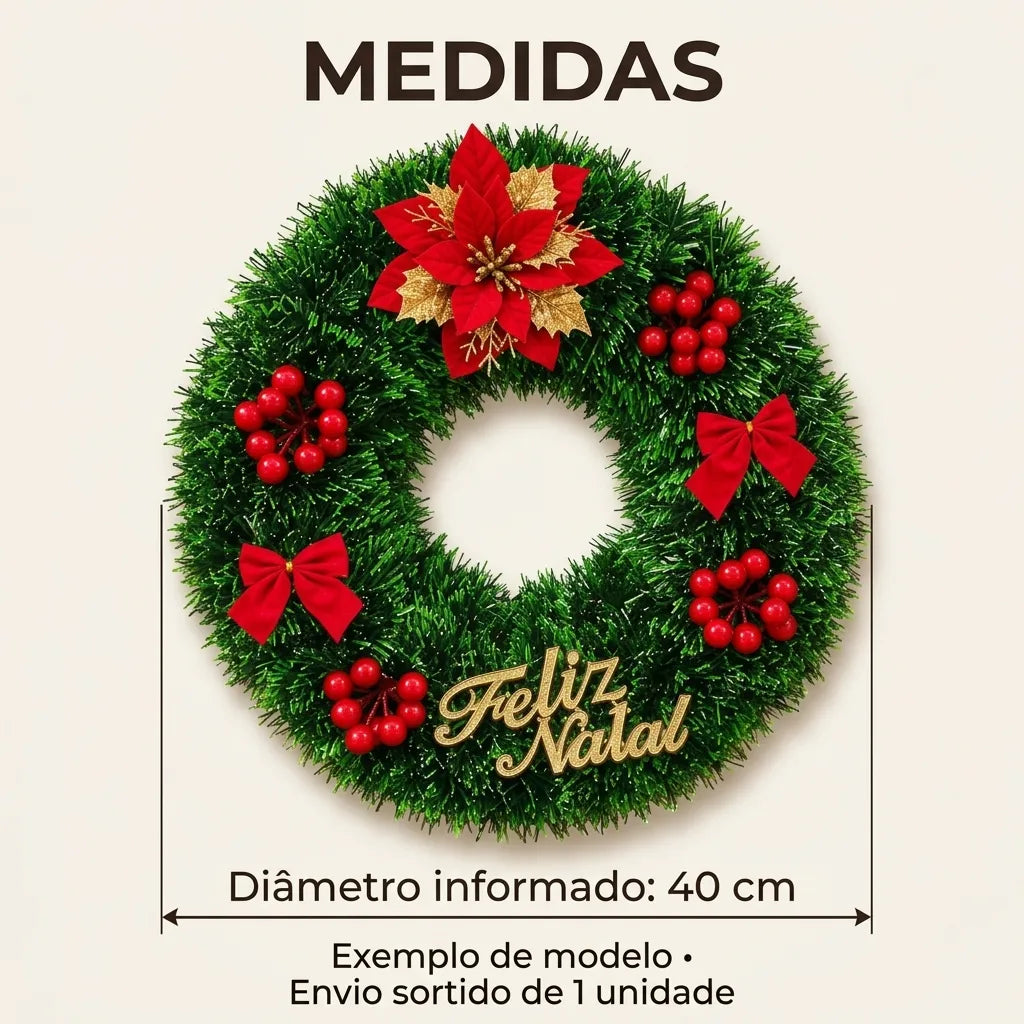 Exemplo de guirlanda sortida com flor, bagas e placa Feliz Natal, diâmetro informado de 40 cm e envio de 1 unidade.