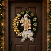 Guirlanda natalina dourada com Papai Noel decorando a porta